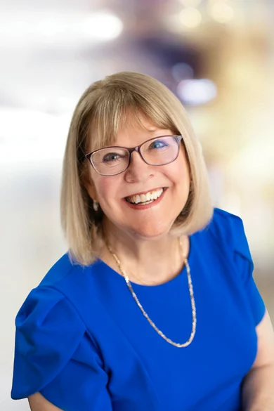 Portrait of Andrea Thomas, REALTOR® | NRLUX.